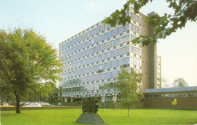 Former Suffolk College buildings in Rope Walk Ipswich. Seven storey tower block with grass lawn in front.
